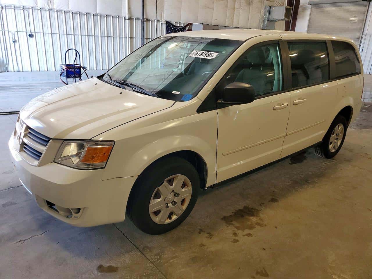 2009 Dodge Caravan — lot COPART #66794986, Avariat Spate