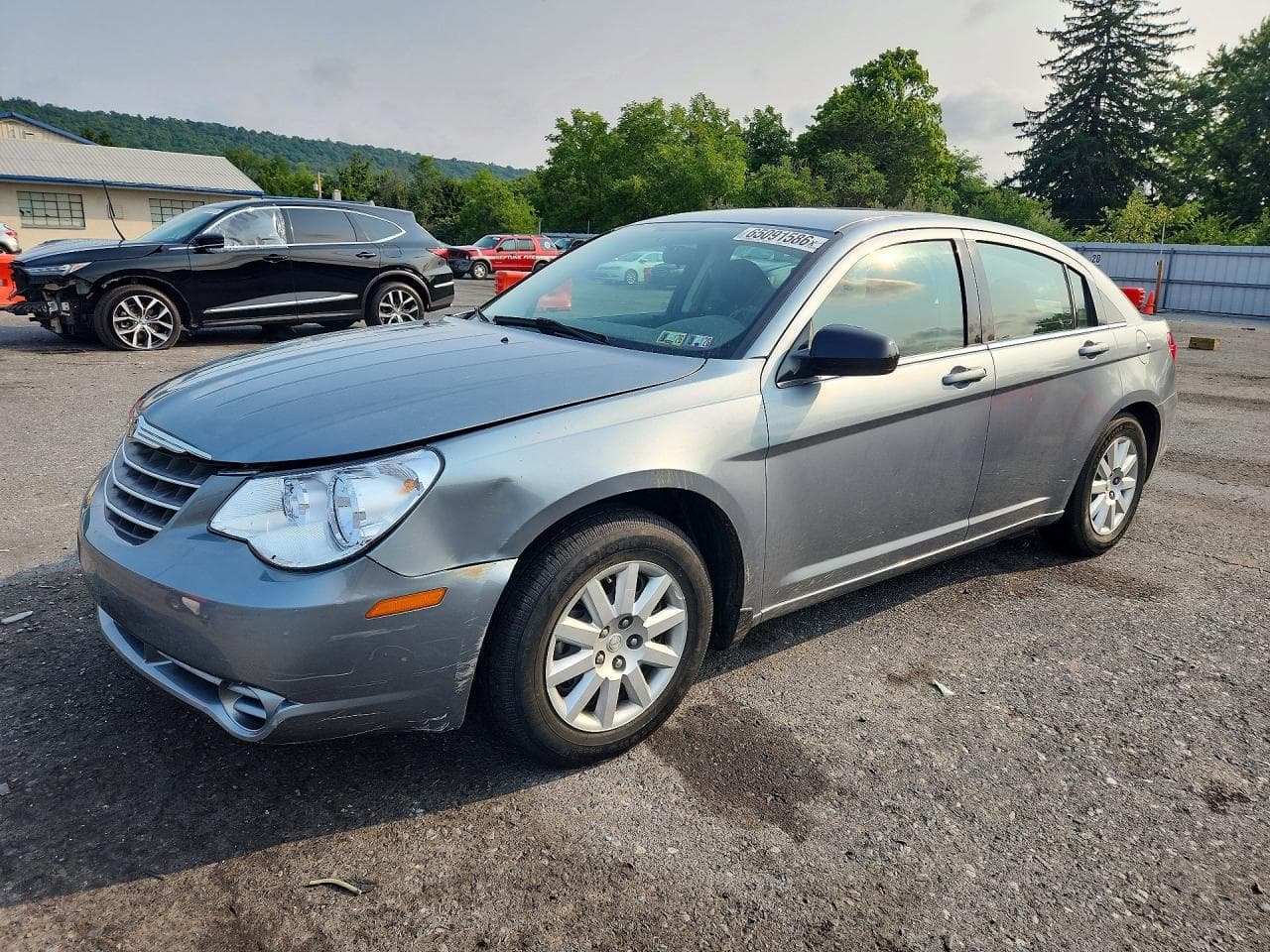 2009 Chrysler Sebring — lot COPART #65091586, Avariat Față