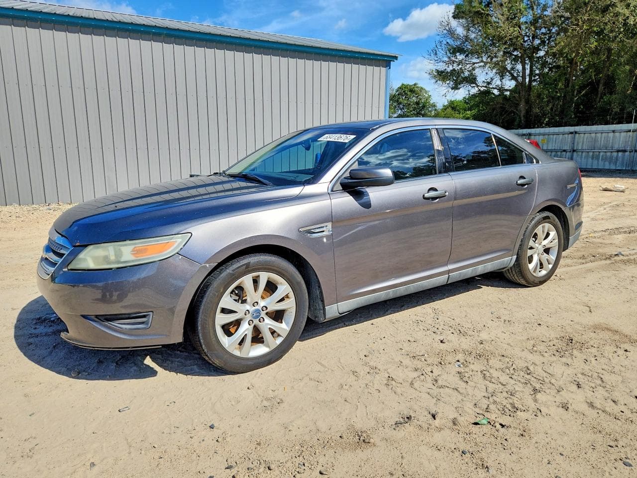 2011 Ford Taurus — lot COPART #68413676, Avariat Lateral